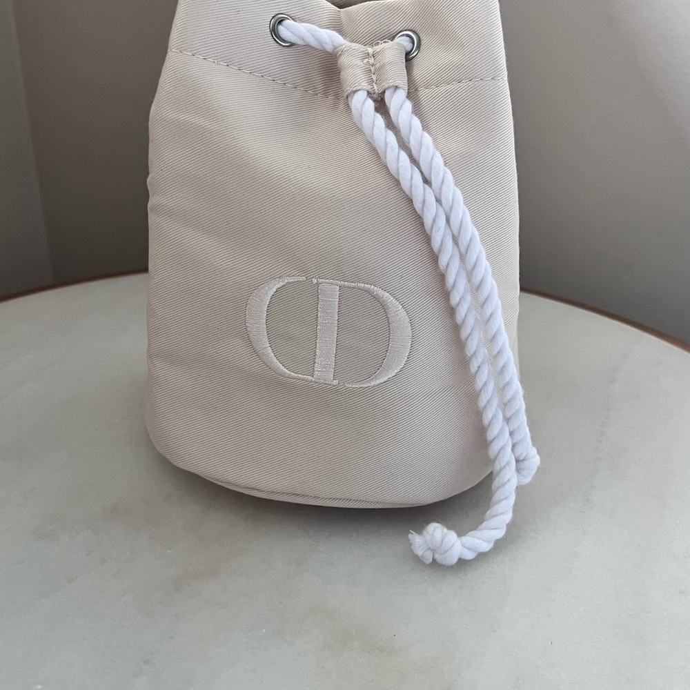 Christian Dior Cream Bucket Bag makeup bag
